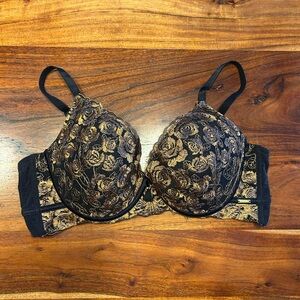 La vie en rose black and gold bra
